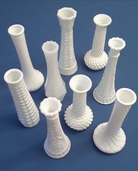 Milk Glass Bud Vases. Party Rentals. Royal Table Settings.