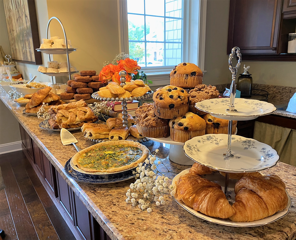Buffet featuring 3-tier stand and 2-Tier Beaded Dessert Stand. Vintage Party Rentals by Royal Table Settings.