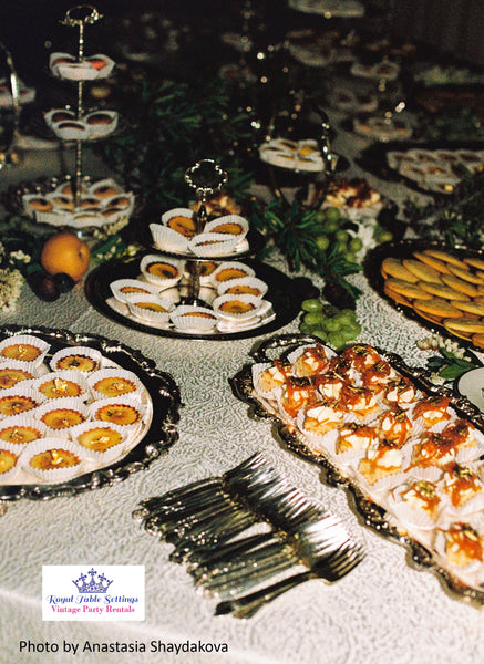 Party Rentals by Royal Table Settings Silver Trays, 3-tier stands, vintage forks and stacked trays
