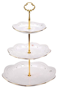 Embossed white 3-tier cake stands party rentals by Royal Table Settings.