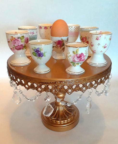 Egg Cups with gold detail and colorful flowers. Party Rentals by Royal Table Settings.