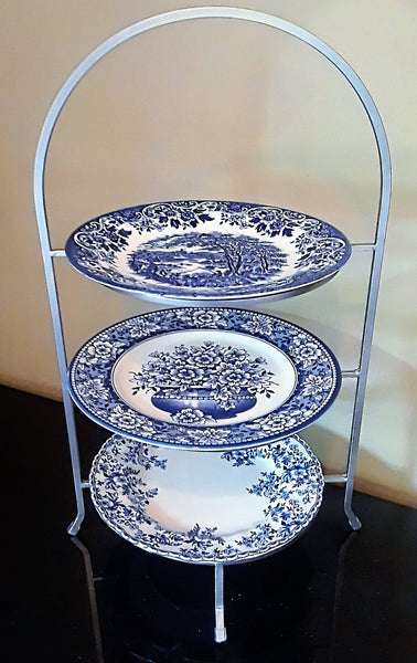 3-Tier Silver Metal Stand with blue and white plates for rent. Vintage Party Rentals. Royal Table Settings