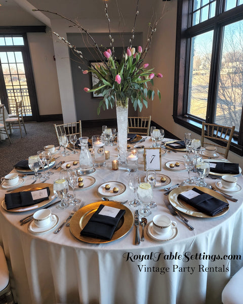 Pilsner Vases and Gold Chargers. Party Rentals by Royal Table Settings.