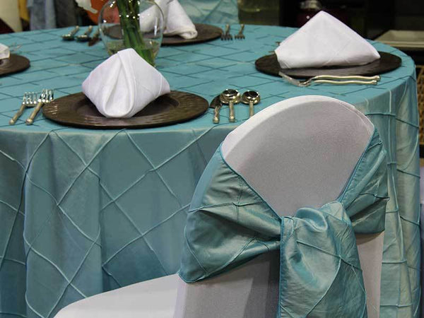 Turquiose Color Pintuck Sashes and Table Linen Examples Rentals by Royal Table Settings