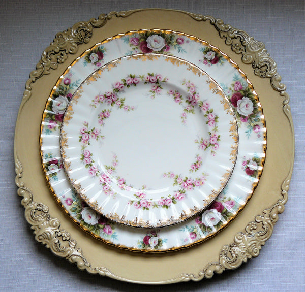 Victorian Charger Ivory with Vintage Plates for Rent